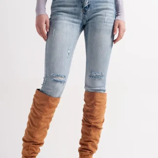 Calças de ganga skinny com detalhes de botões em azul claro