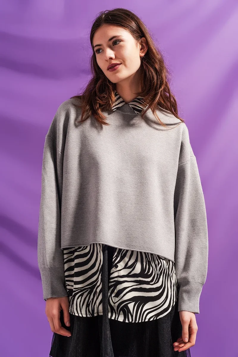 Camisola cinzenta curto com mangas de morcego