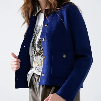 Cardigan de malha macia em azul tinta com bolsos frontais