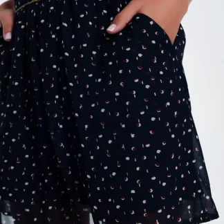 Mini saia com pregas e bolinhas